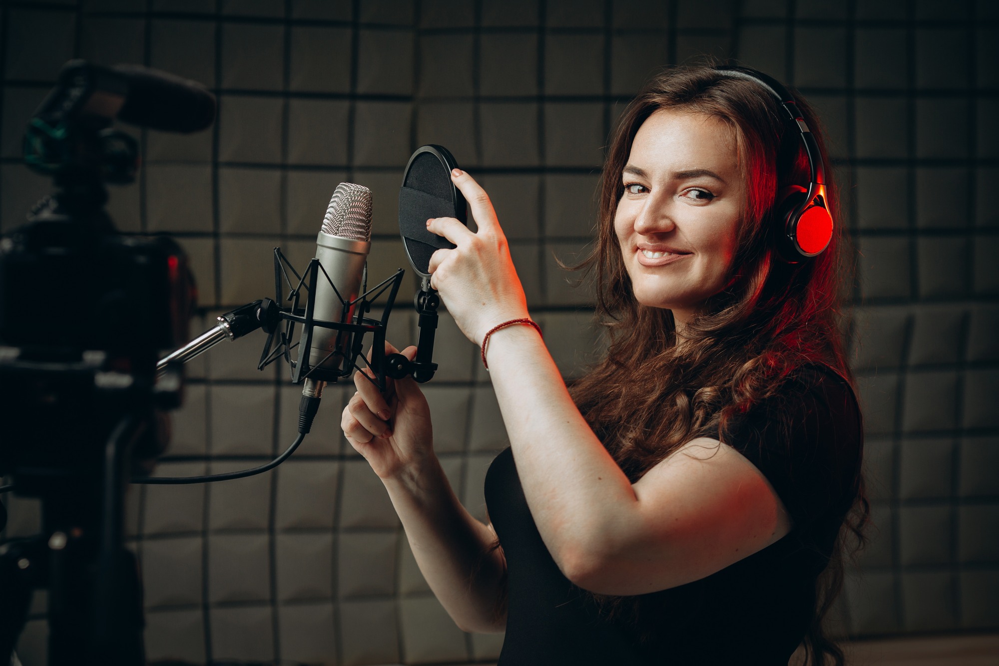 young woman taking voiceover course to improve voice acting skills